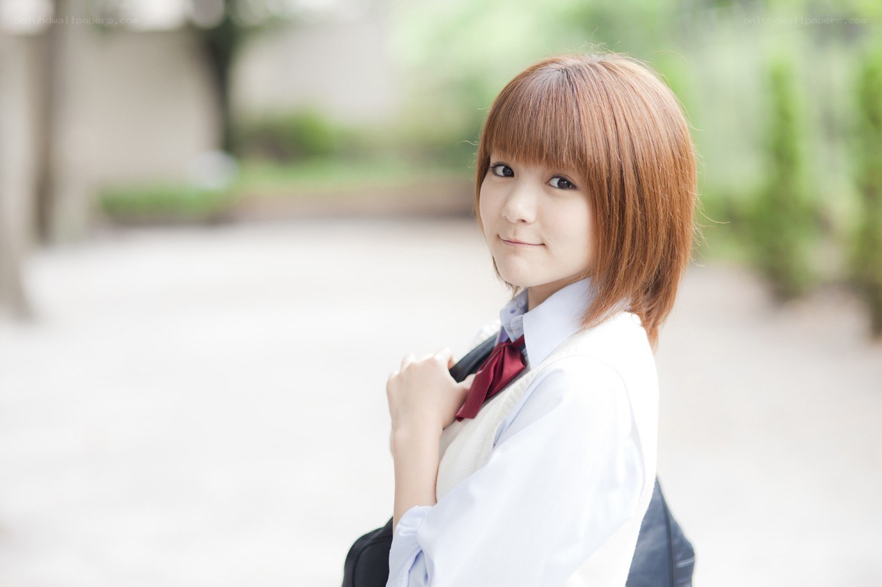 student in school uniform