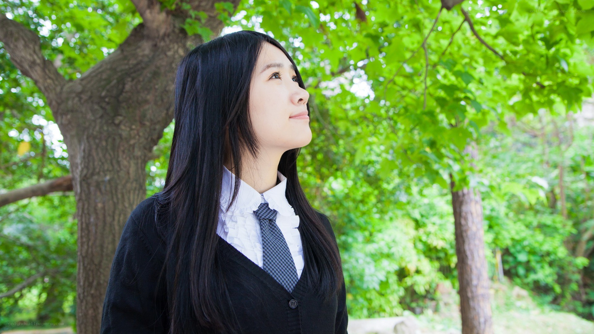student in school uniform outdoors