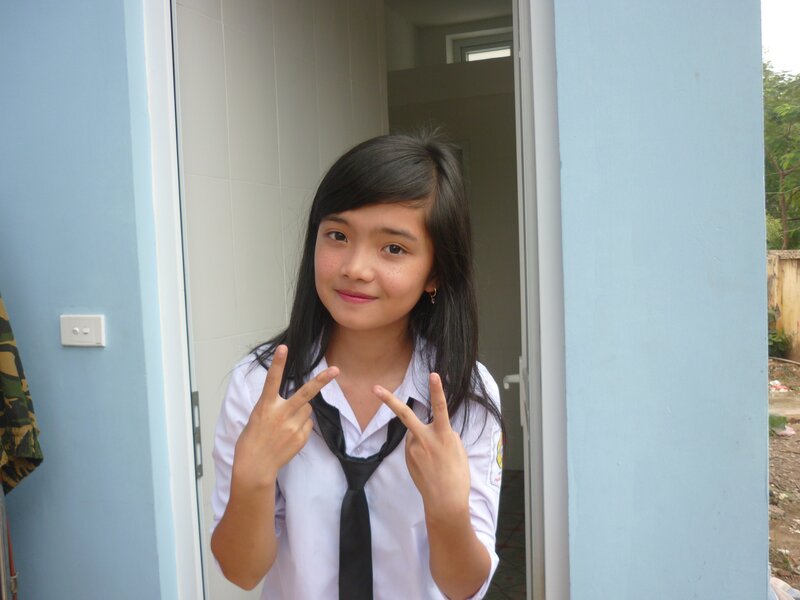student making peace signs