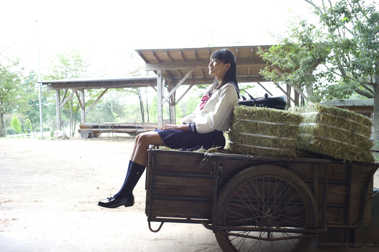 Student on a hay cart