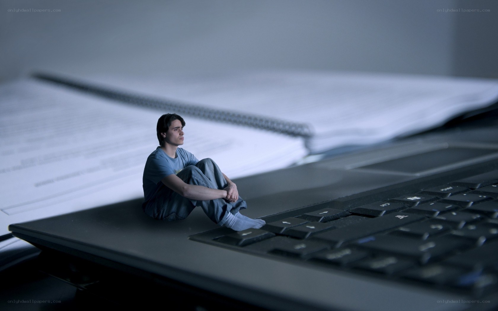 Student on laptop keyboard
