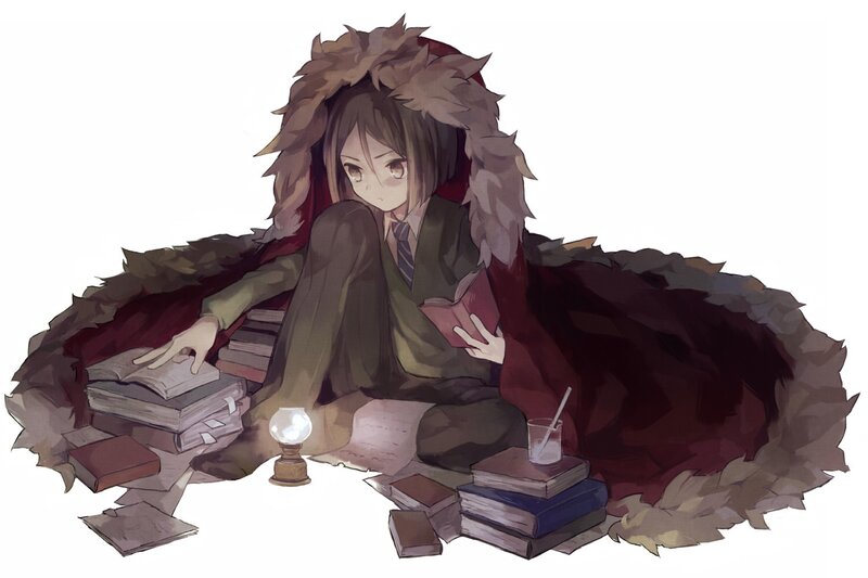student reading in a cloak