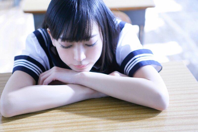 student resting at desk