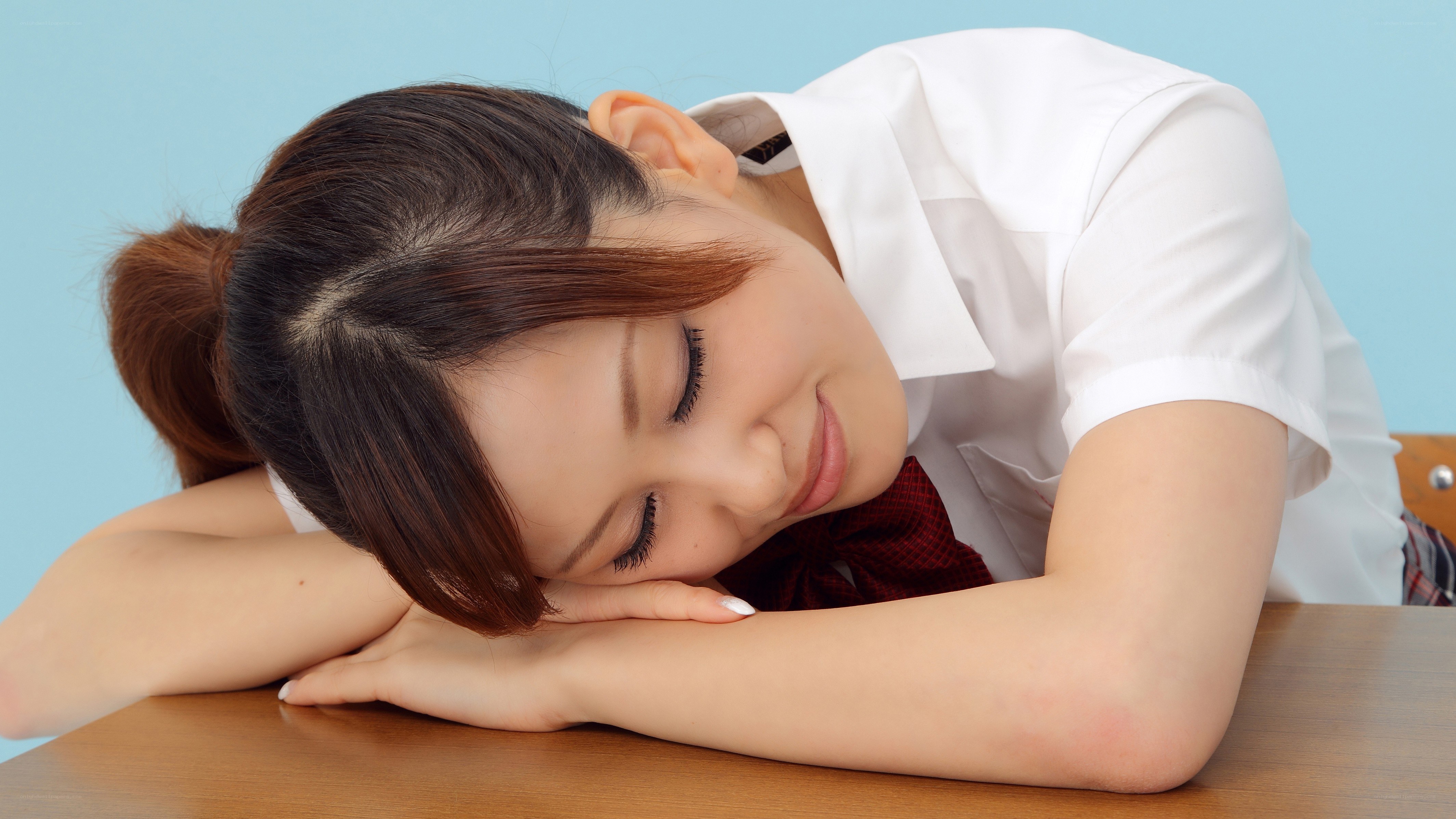 student resting at desk