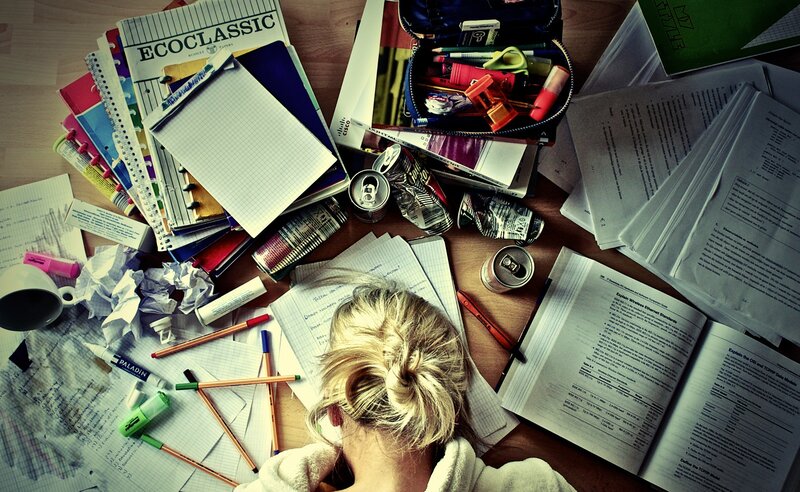 Student Studying at Desk — Brown, Busy