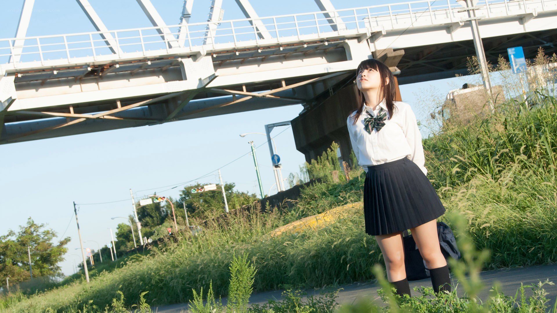 Student under a bridge