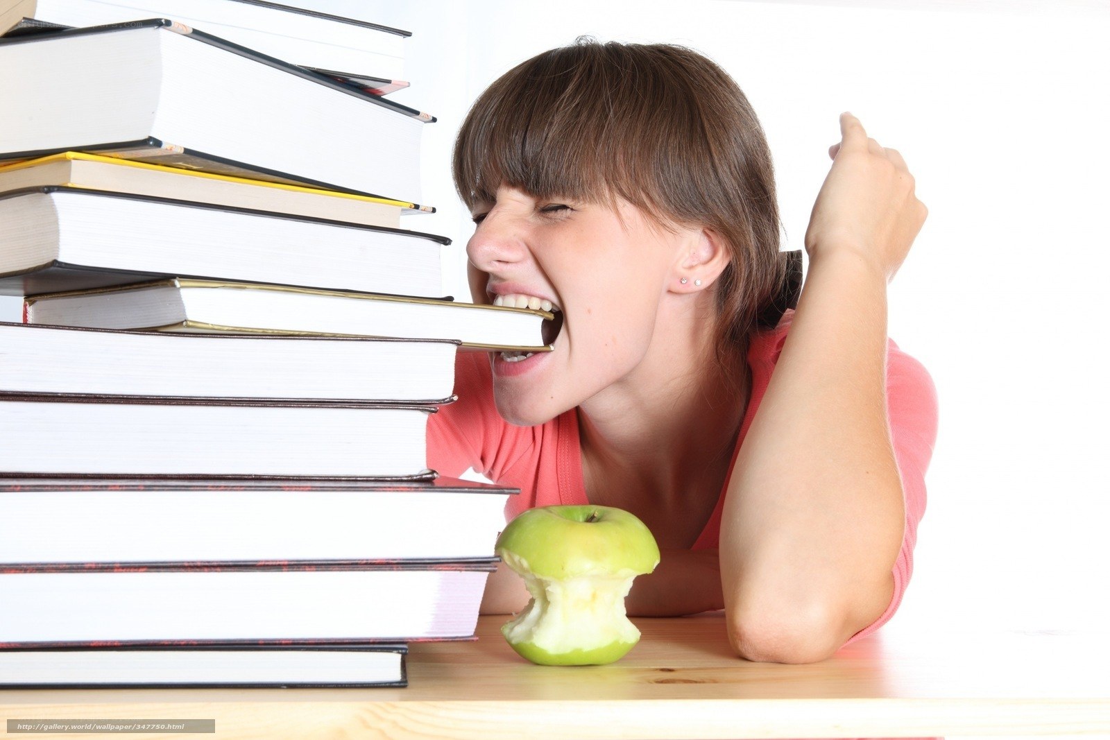 student with books and apple