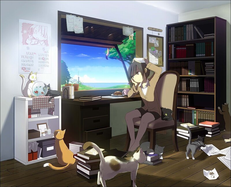 Student with cats at desk