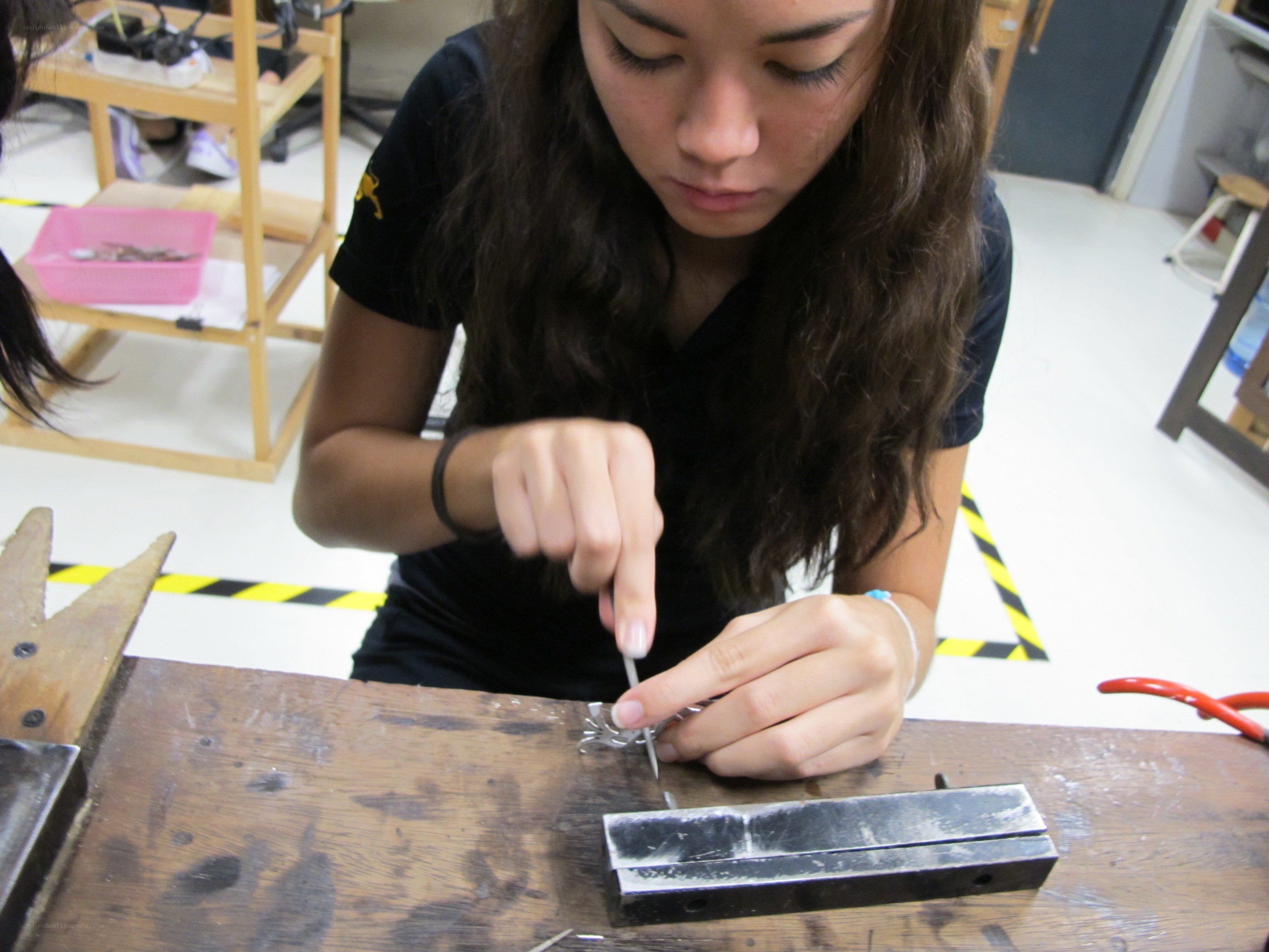 Student working on metal project