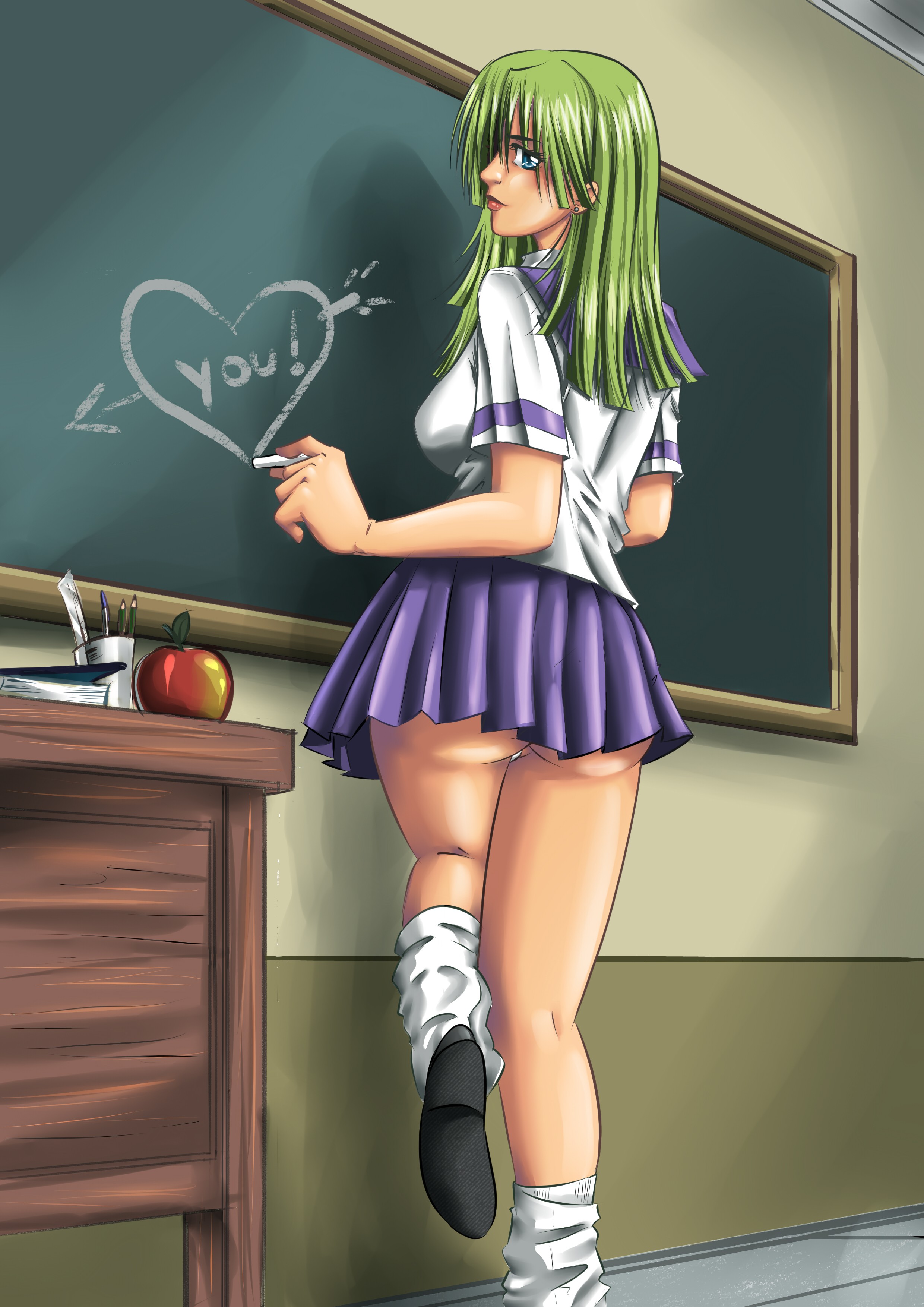 Student writing on chalkboard