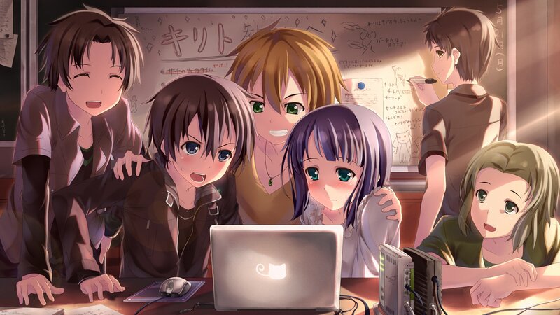 Students around a laptop