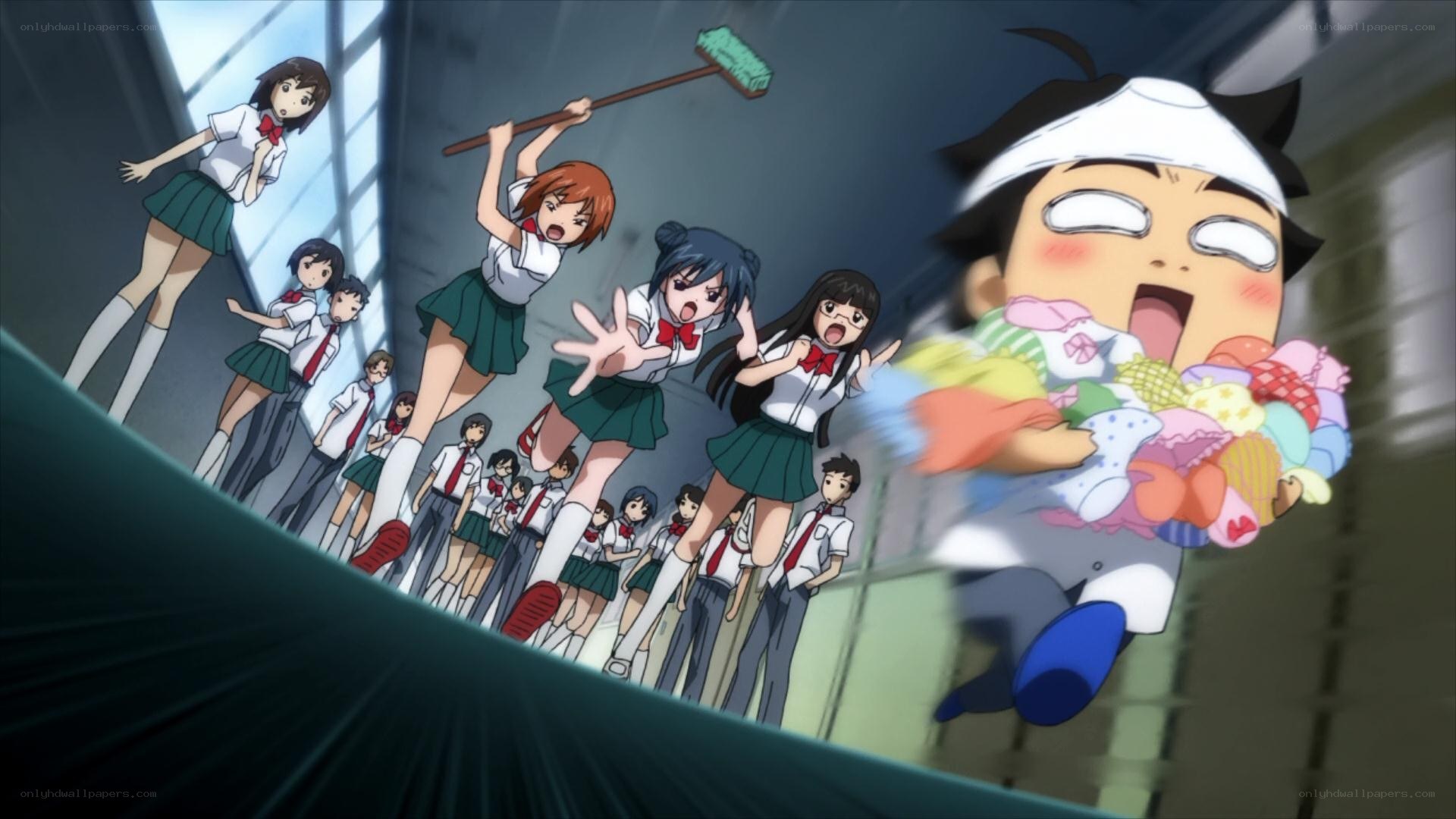 Students chase boy with broom