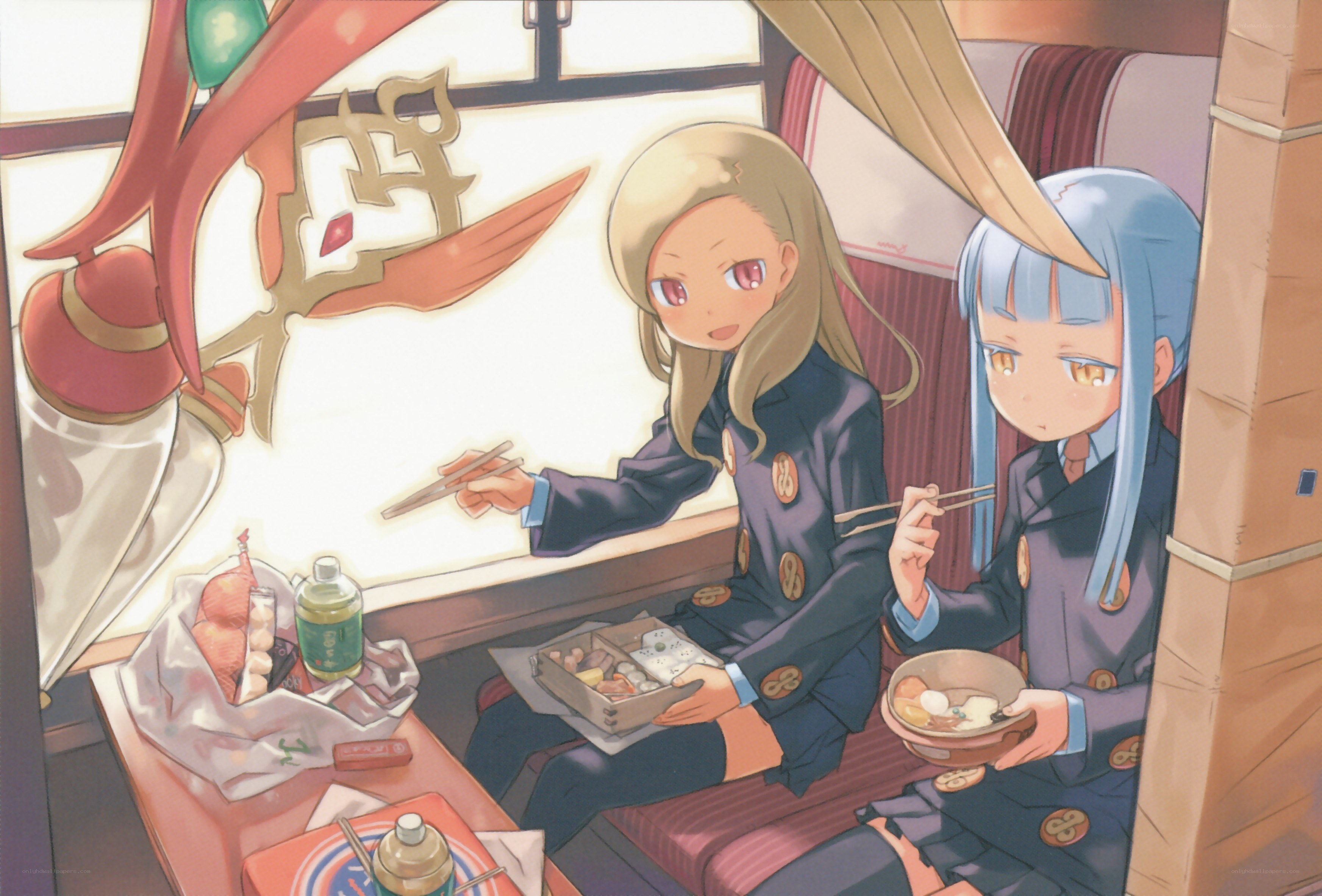 Students eating bento on a train