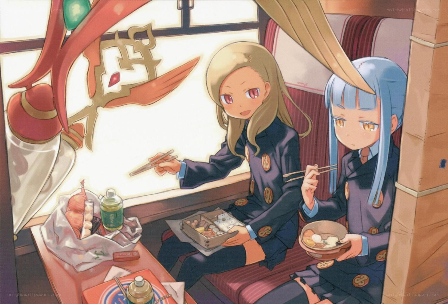 Students eating on a train