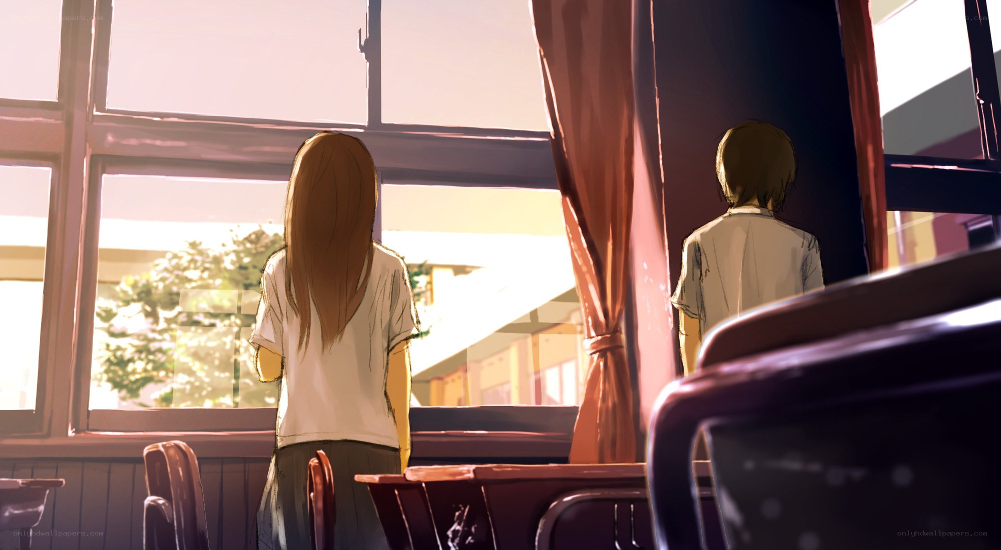 Students in a classroom at sunset