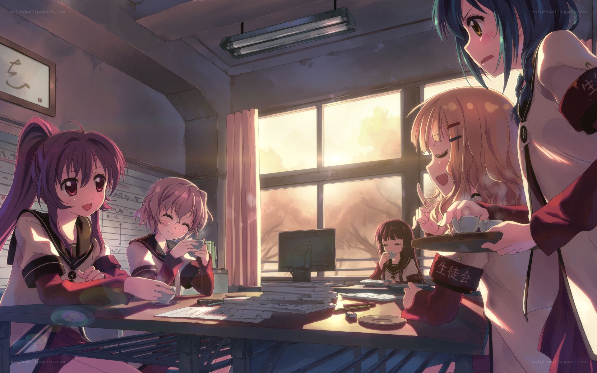 Students in a classroom at sunset