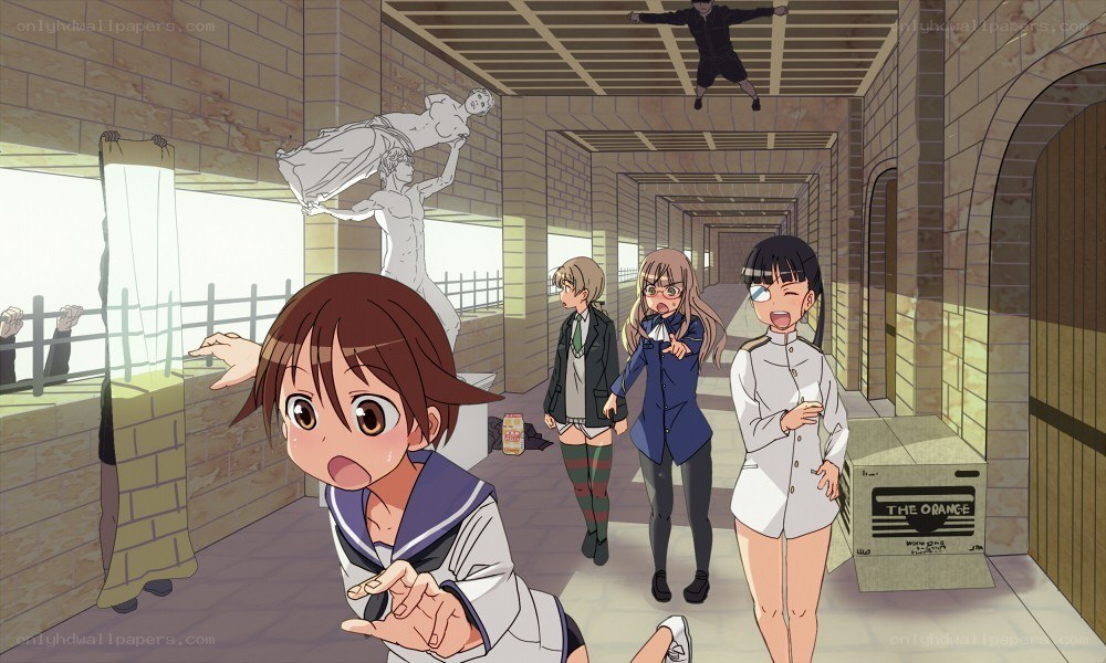 Students in a hallway with statues