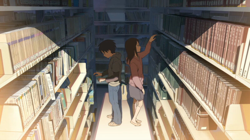 Students in a library aisle