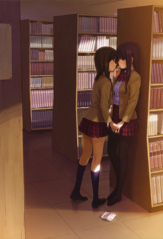 Students in library embrace