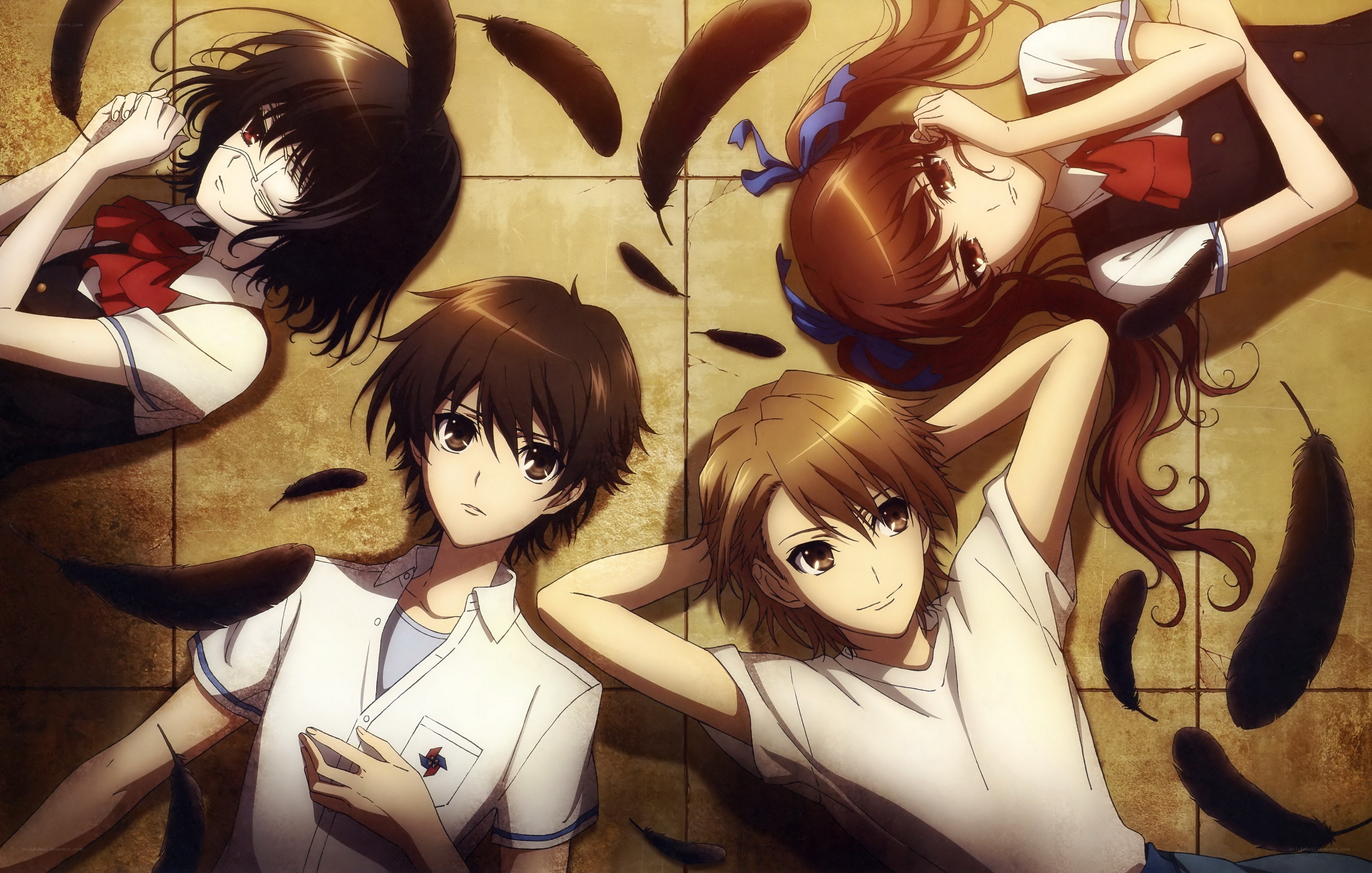 Students lying on the floor with feathers