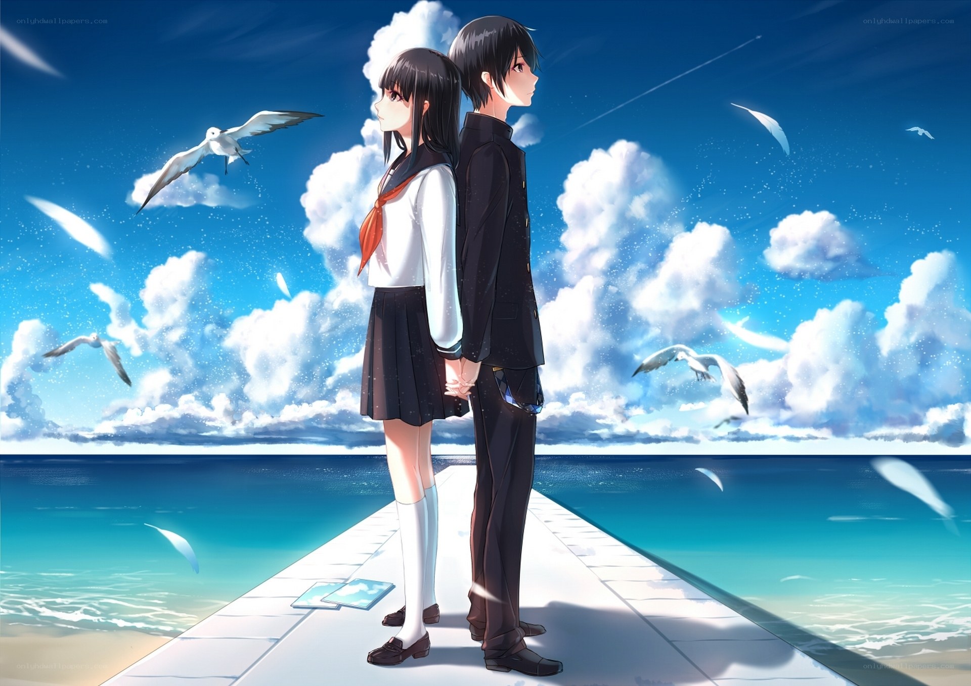 Students on a pier by the sea