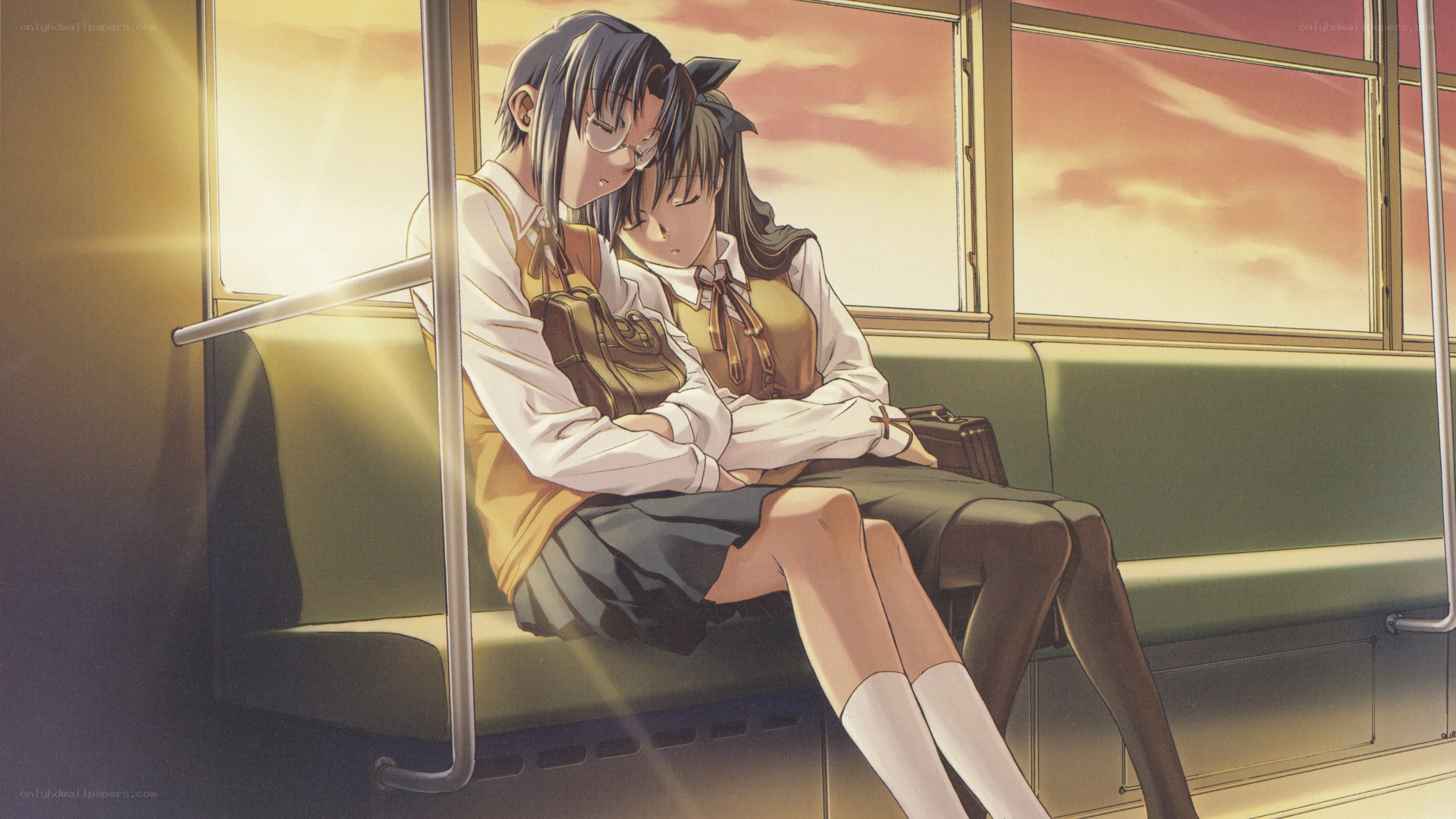 Students on a train at sunset