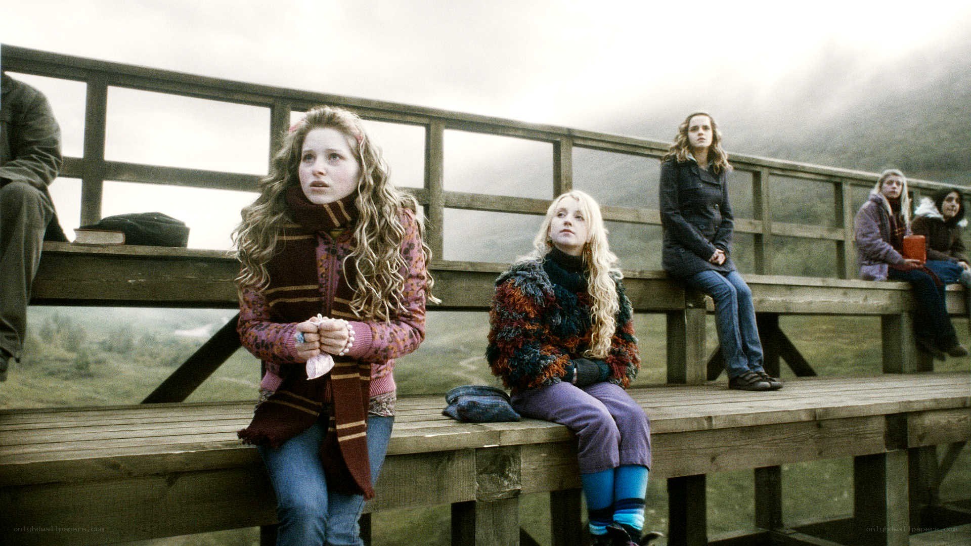 students on a wooden bridge