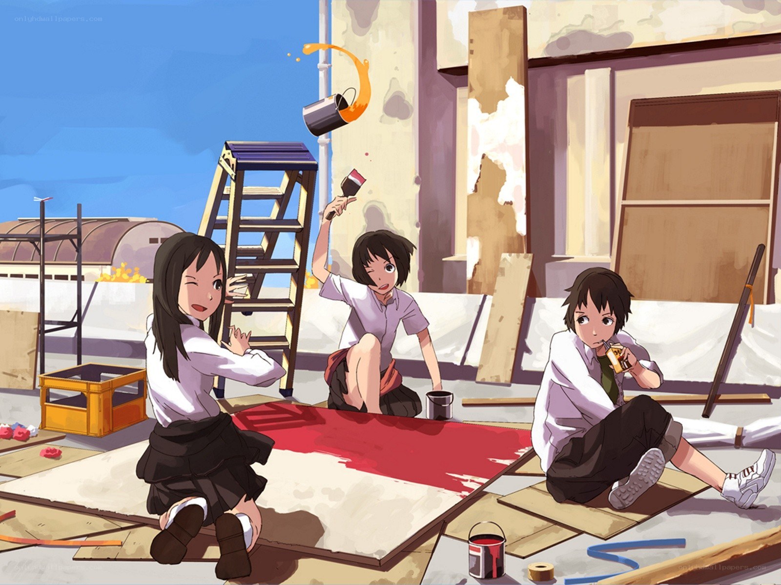 Students painting a stage