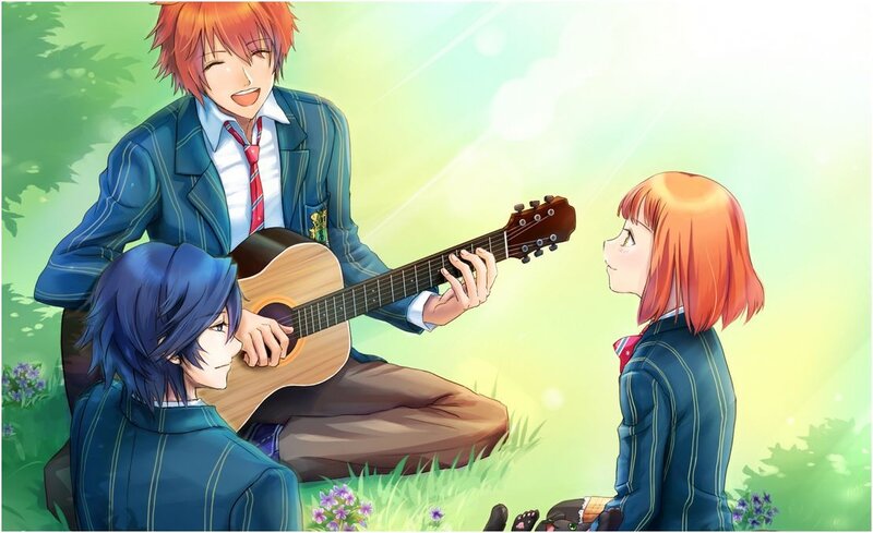 Students playing guitar in a field