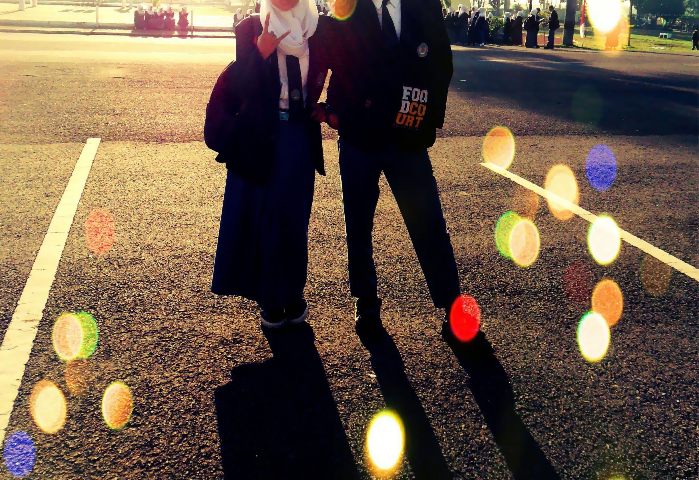 Students posing on a road