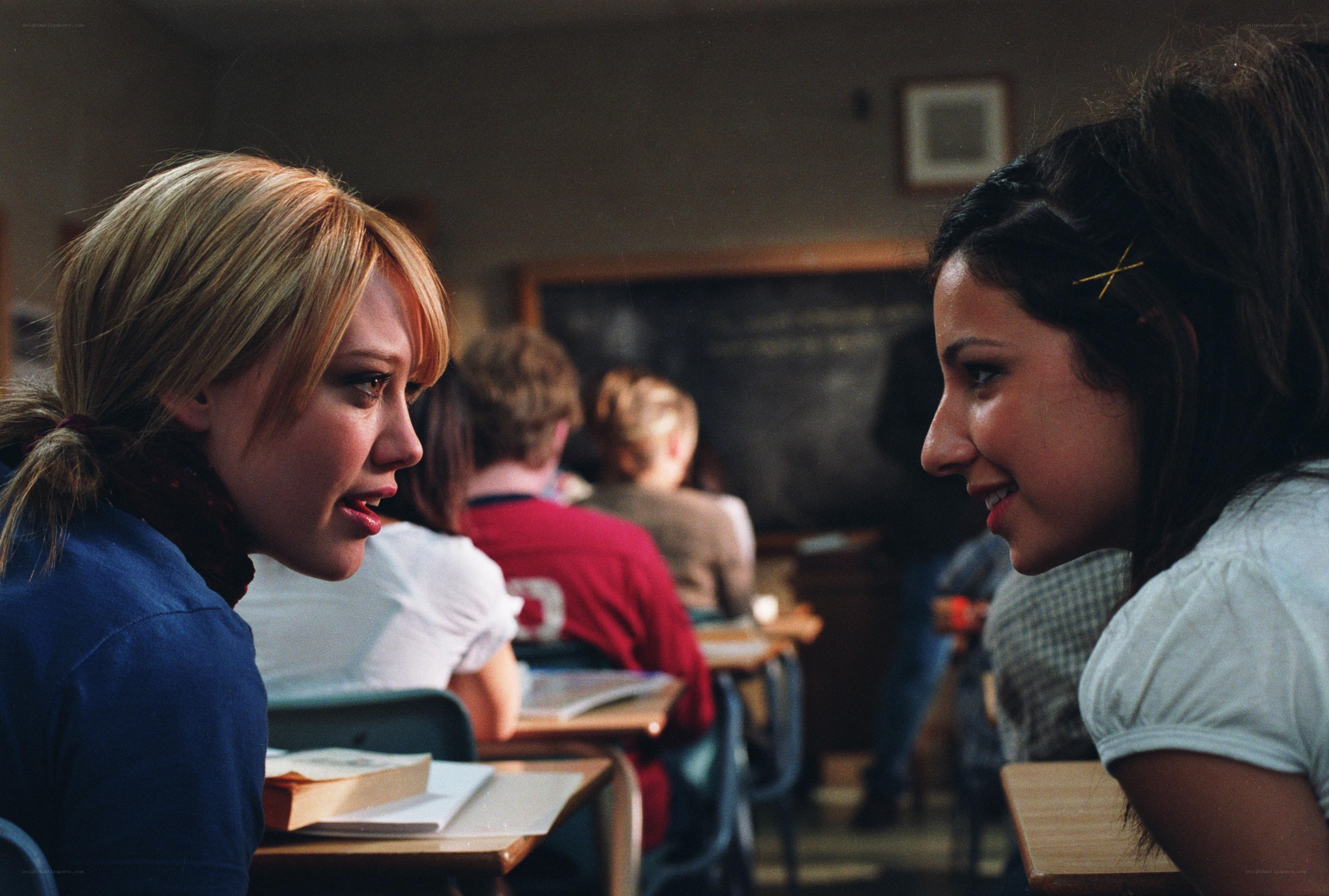 Students talking in a classroom