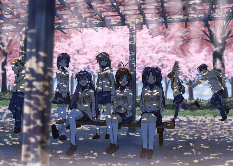Students under a cherry blossom trellis