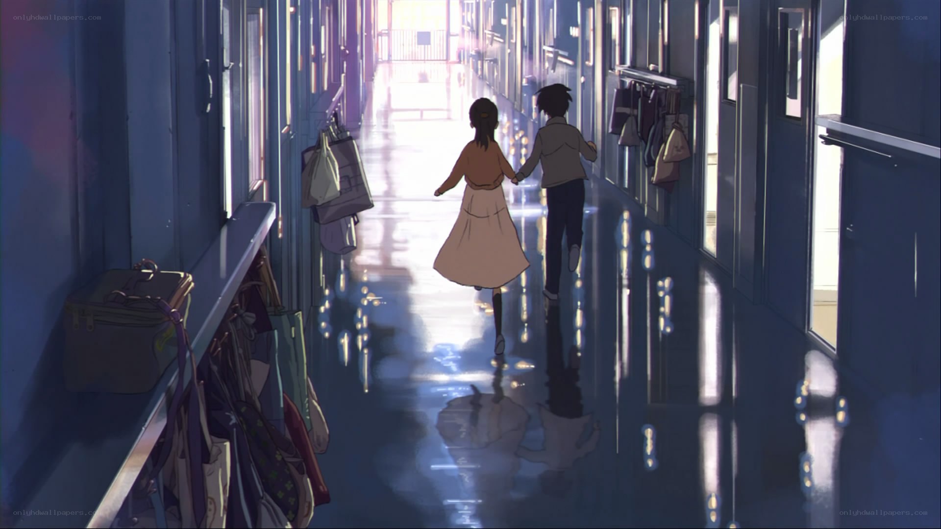 students walking in school hallway