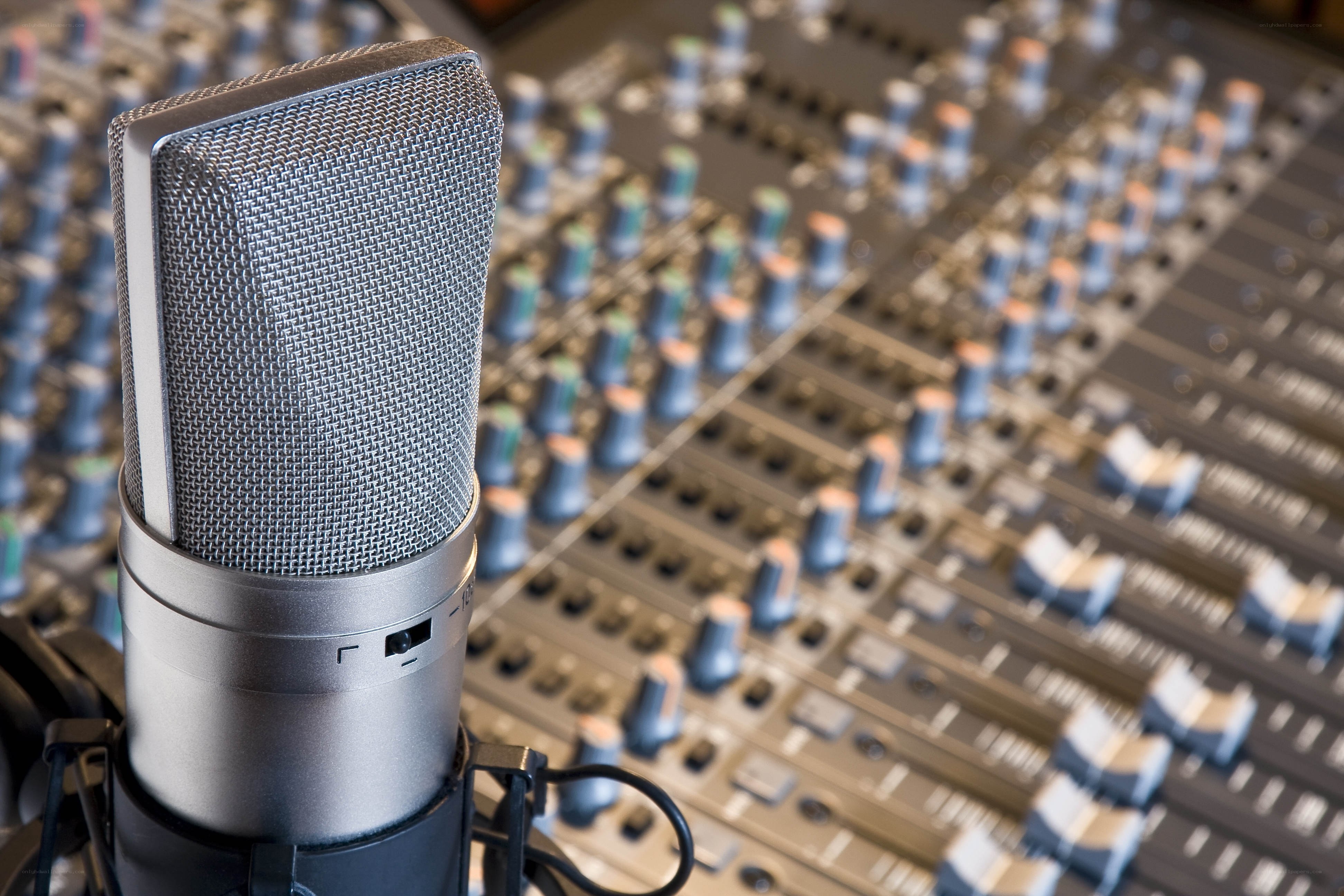 Studio microphone on mixing board