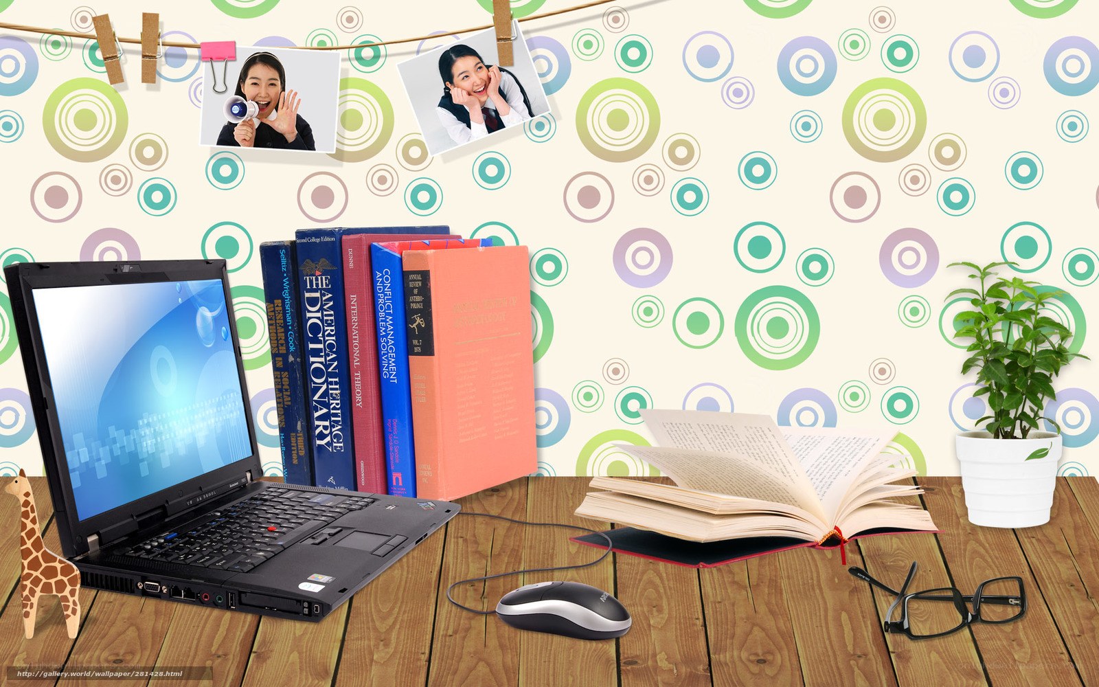 Study desk with laptop and books