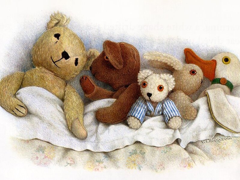 Stuffed animals in bed