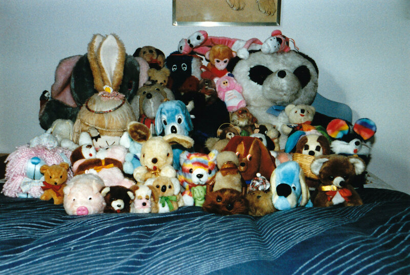stuffed animals on a bed