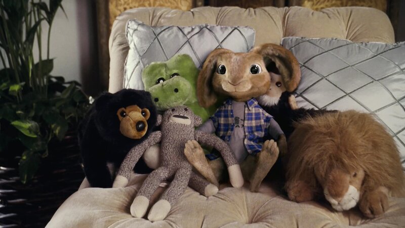 Stuffed animals on a couch
