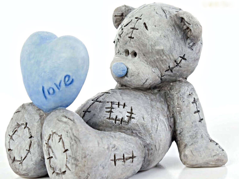 Stuffed Bear Holding Heart