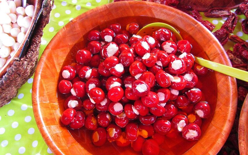 Stuffed cherry peppers in a wooden bowl
