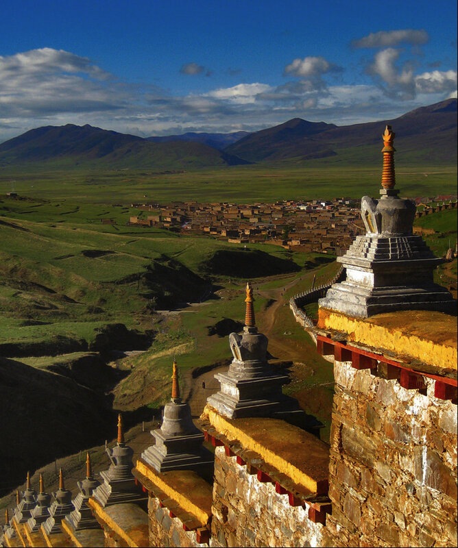 Stupas overlooking a Tibetan village