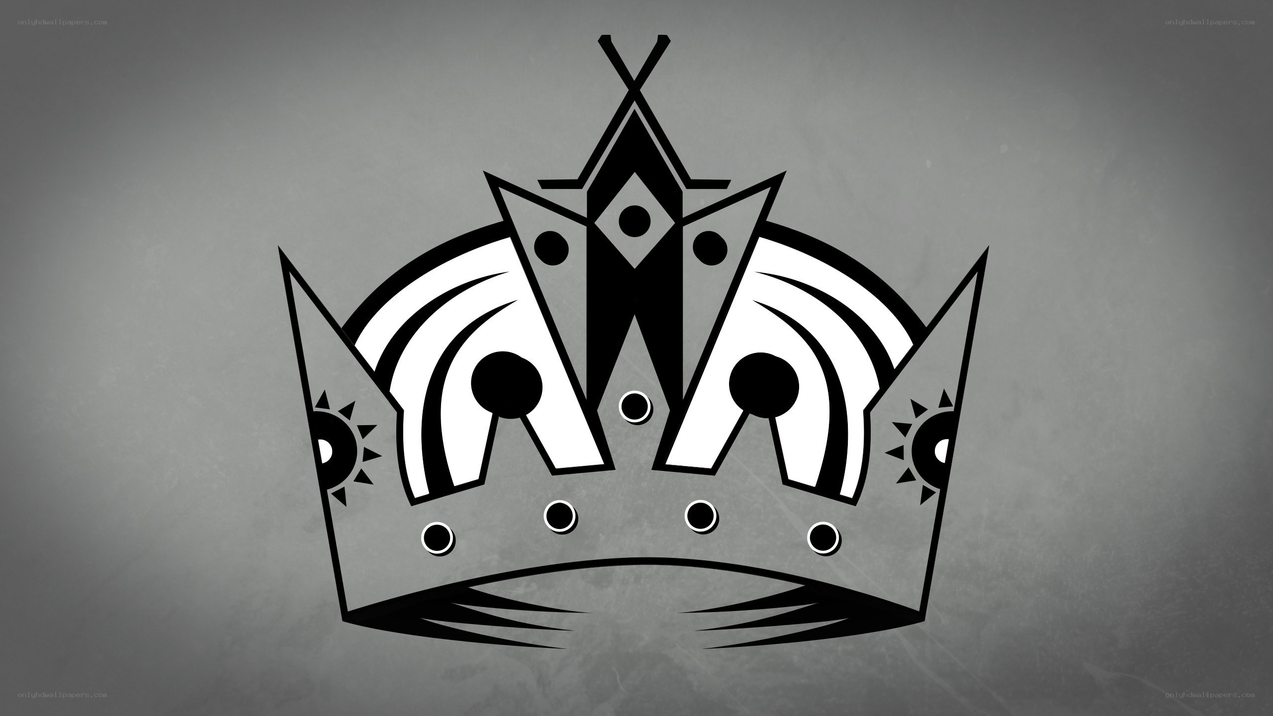 stylized crown logo