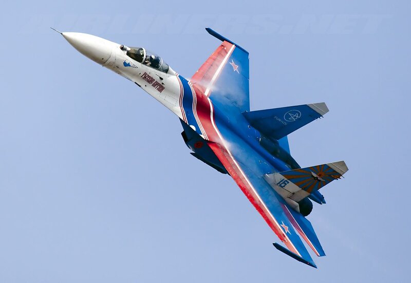 Su-27 Fighter Jet — Blue, Dynamic, Afternoon, Photograph, Sky