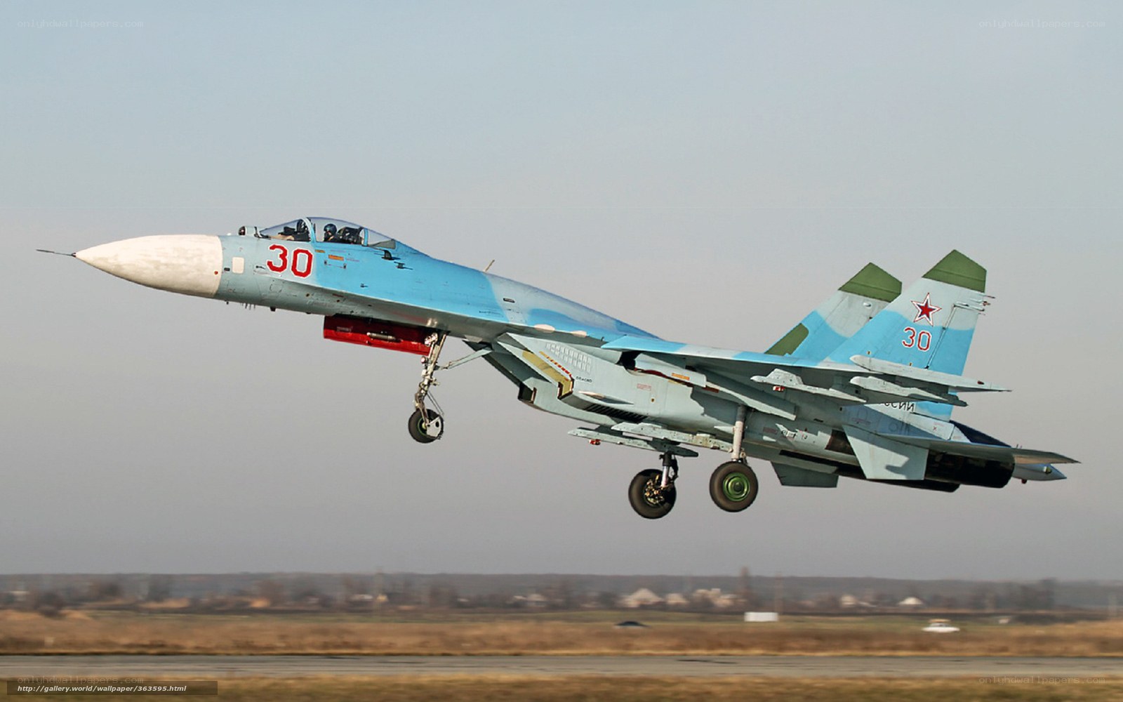 Su-30 fighter jet taking off