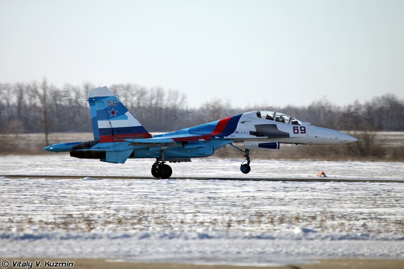 Su-30 jet on snowy runway