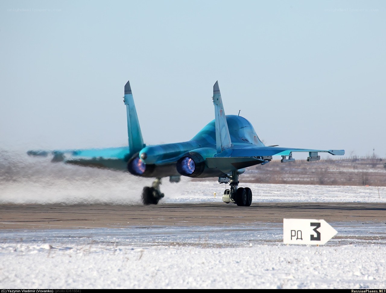 Su-34 jet on snowy runway
