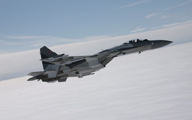 Su-35 Fighter Jet — Gray, Dramatic, Photograph, Clouds