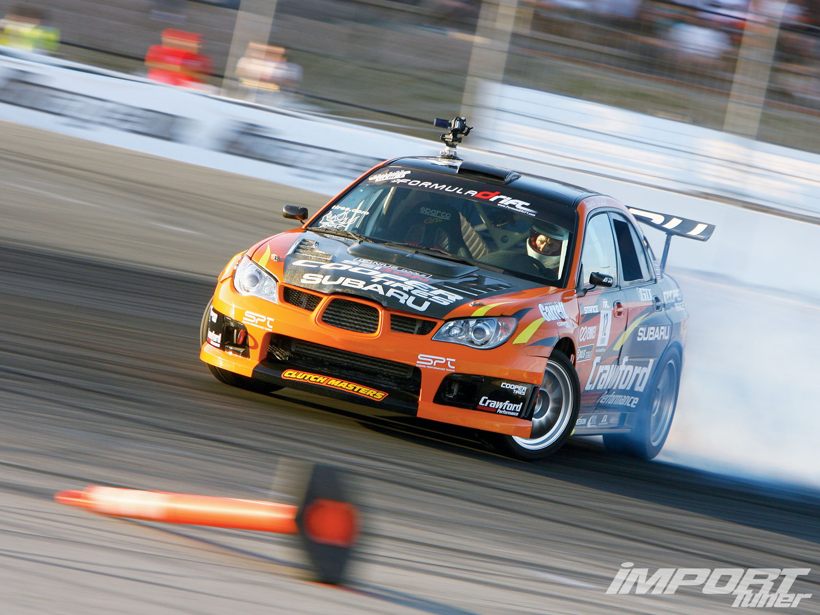 Subaru drifting on track