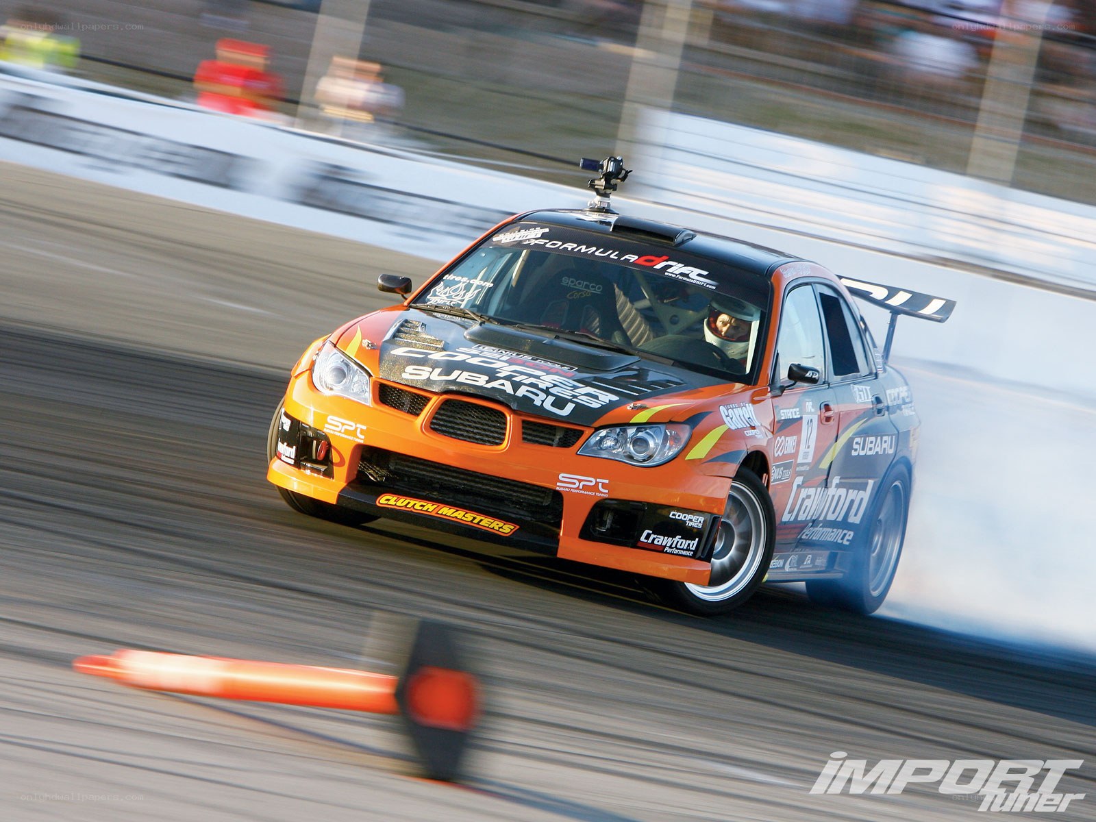 Subaru drifting on track