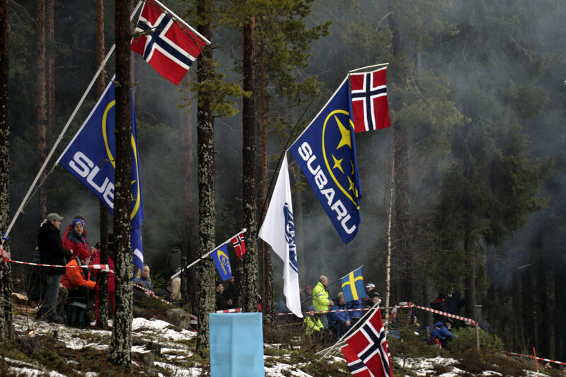 Subaru flags at a forest event